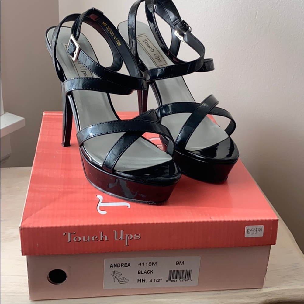 Black patent leather heels.